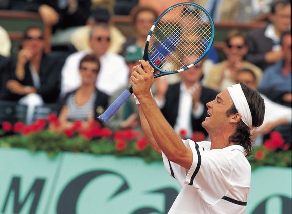 Carlos Moya winning Roland Garros. 