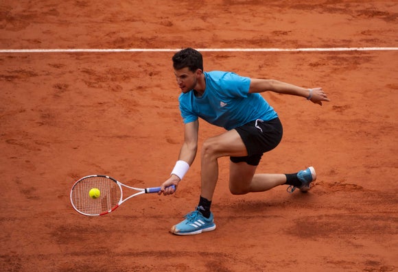Dominic Thiem volleys using the new Pure Strike at Roland Garros 2019.